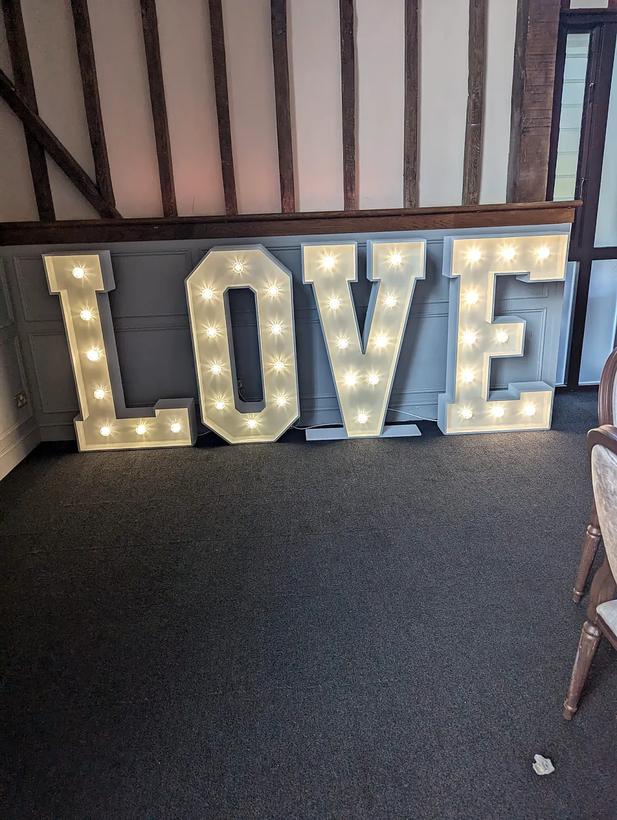 Premium illuminated wedding letters styled for a Kensington or Chelsea event